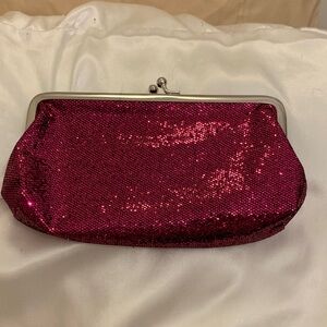 Free with purchase!! Glamorous Fuchsia Sequin small Clutch or make up bag.